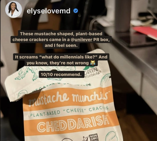 Image of open Cheddarish bag from customer with the message These mustache shaped, plantbased cheese crackers came in a @unilever PR box and I feel seen.  It screams 